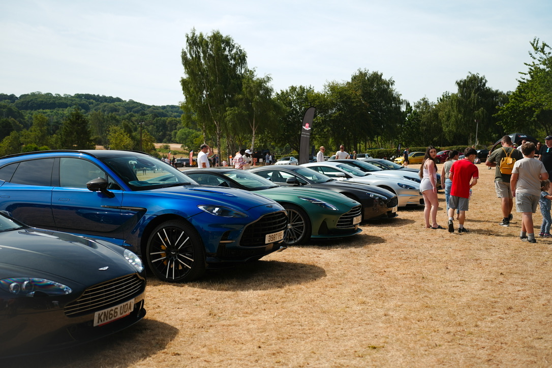 Lineup of Aston Martins