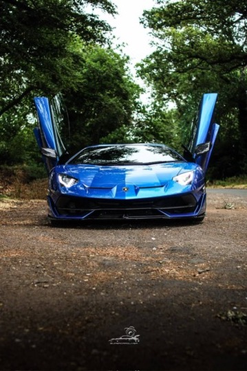 Lamborghini front, doors open