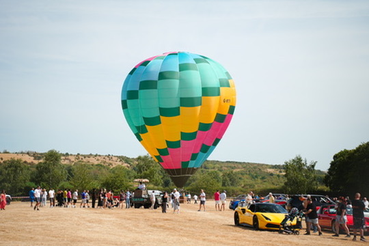 Hot air balloon over the car park